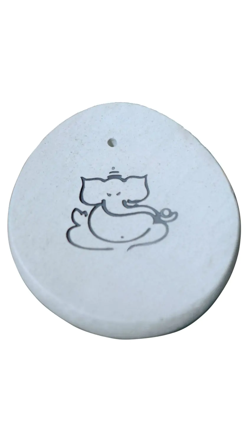  Product image 1 of the product “White stone with Ganesha calligraphy as incense holder ”